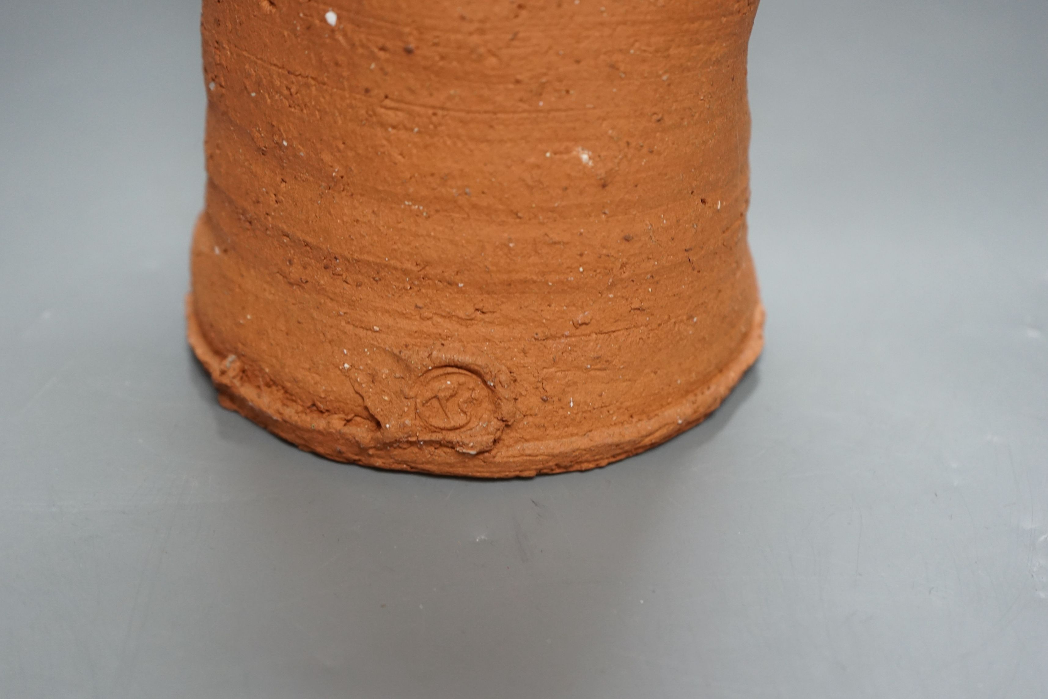 Peter Smith, a thrown terracotta cylindrical vessel with white glaze to the interior and brown nose vessel, with original purchase receipt, impressed mark to base rim, 26.5cm tall